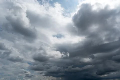 Dark storm clouds with background,Dark clouds before a thunder-storm. Stockfoto's