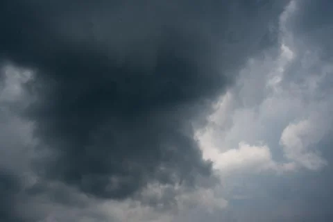 Dark storm clouds with background,Dark clouds before a thunder-storm. Stock Photos