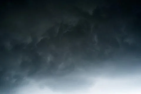 Dark storm clouds with background,Dark clouds before a thunder-storm. Stock Photos