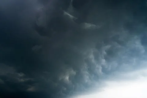 Dark storm clouds with background,Dark clouds before a thunder-storm. Stock Photos