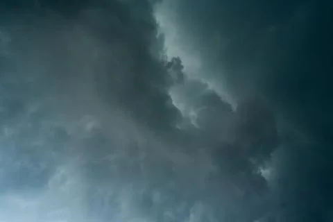Dark storm clouds with background,Dark clouds before a thunder-storm. Stock Photos