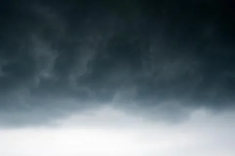 Dark storm clouds with background,Dark clouds before a thunder-storm. Photos