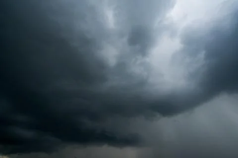 Dark storm clouds with background,Dark clouds before a thunder-storm. Stock Photos
