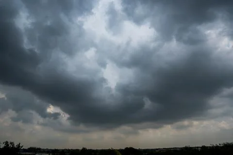 Dark storm clouds with background,Dark clouds before a thunder-storm. Stock Photos