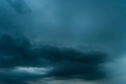Dark storm clouds with background,Dark clouds before a thunder-storm. Stock Photos