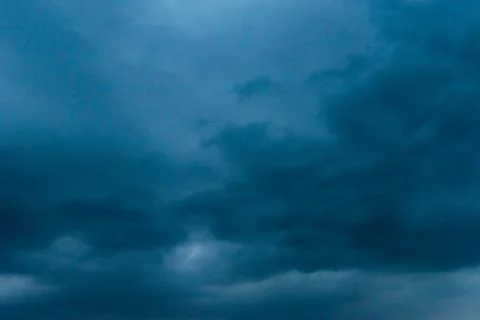 Dark storm clouds with background,Dark clouds before a thunder-storm. Stock Photos
