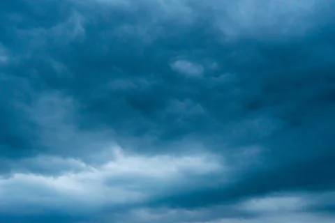 Dark storm clouds with background,Dark clouds before a thunder-storm. Stock Photos
