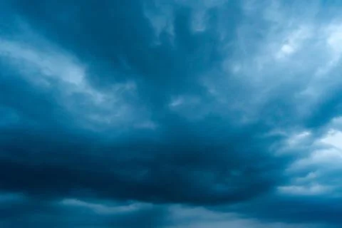 Dark storm clouds with background,Dark clouds before a thunder-storm. 写真素材