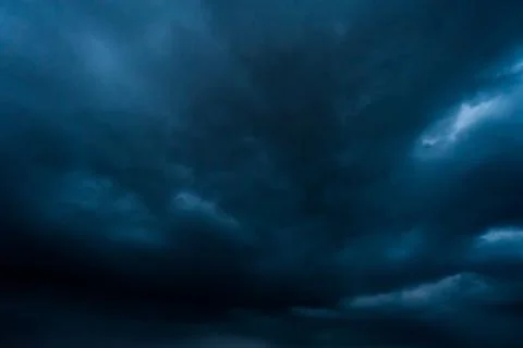 Dark storm clouds with background,Dark clouds before a thunder-storm. Stock Photos