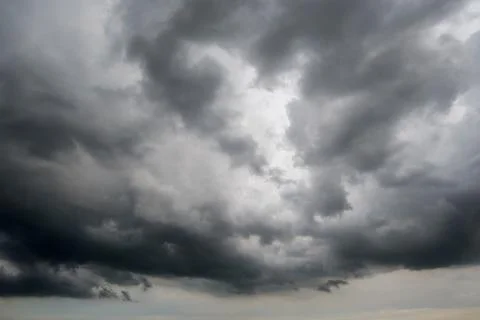 Dark storm clouds with background,Dark clouds before a thunder-storm. Stock Photos