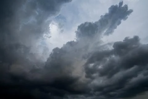 Dark storm clouds with background,Dark clouds before a thunder-storm. Stock Photos
