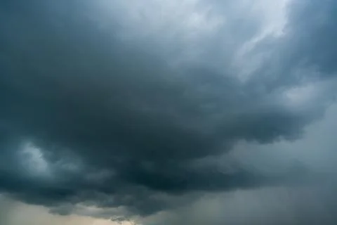 Dark storm clouds with background,Dark clouds before a thunder-storm. Stock Photos