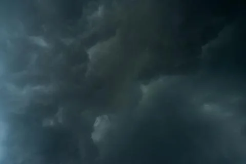Dark storm clouds with background,Dark clouds before a thunder-storm. Stockfoto's