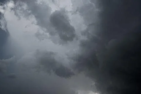 Dark storm clouds with background,Dark clouds before a thunder-storm. Stock Photos
