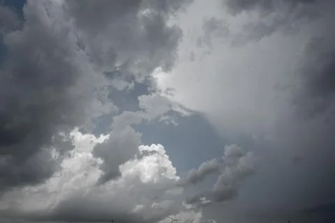 Dark storm clouds with background,Dark clouds before a thunder-storm. Stock Photos