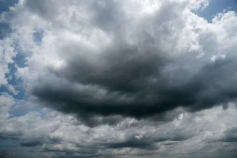 Dark storm clouds with background,Dark clouds before a thunder-storm. Stock Photos