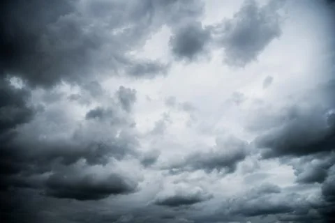 Dark storm clouds with background,Dark clouds before a thunder-storm. Stock Photos