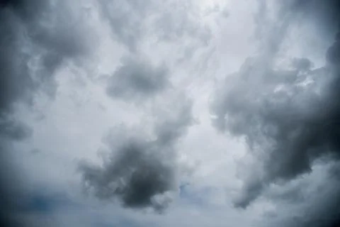 Dark storm clouds with background,Dark clouds before a thunder-storm. Stock Photos
