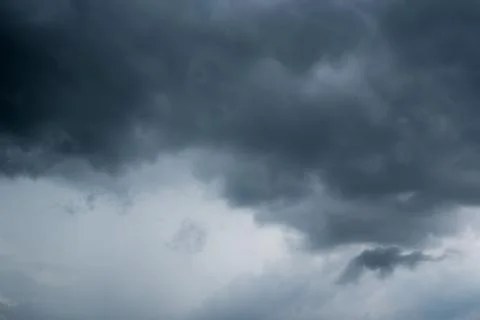 Dark storm clouds with background,Dark clouds before a thunder-storm. Stock Photos