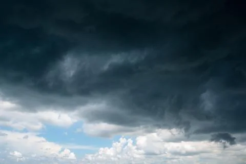 Dark storm clouds with background,Dark clouds before a thunder-storm. Stock Photos