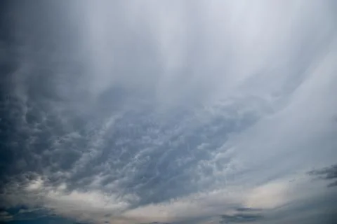 Dark storm clouds with background,Dark clouds before a thunder-storm. Stock Photos