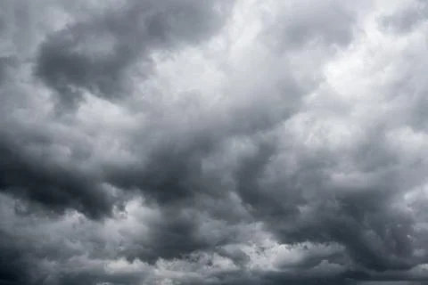 Dark storm clouds with background,Dark clouds before a thunder-storm. Stock Photos