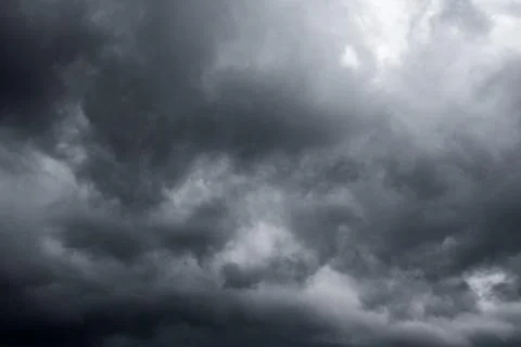 Dark storm clouds with background,Dark clouds before a thunder-storm. Stock Photos
