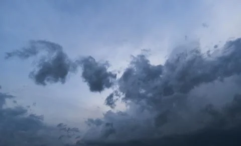 Dark storm clouds with background,Dark clouds before a thunder-storm. Stock Photos