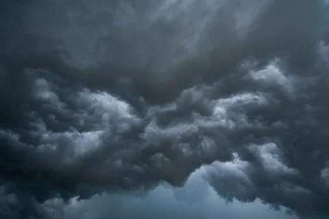 Dark storm clouds with background,Dark clouds before a thunder-storm. Фото