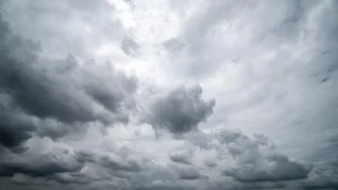 Dark storm clouds with background,Dark clouds before a thunder-storm. Stockfoto's