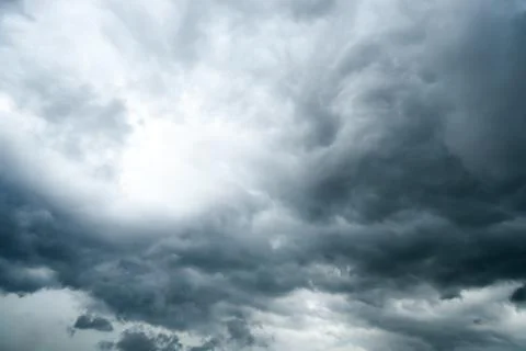 Dark storm clouds with background,Dark clouds before a thunder-storm. Stock Photos