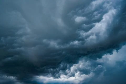 Dark storm clouds with background,Dark clouds before a thunder-storm. Stock Photos