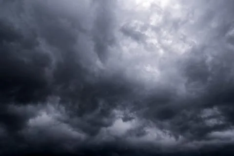 Dark storm clouds with background,Dark clouds before a thunder-storm. Фото