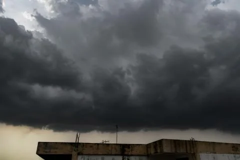 Dark storm clouds with background,Dark clouds before a thunder-storm. Stock Photos