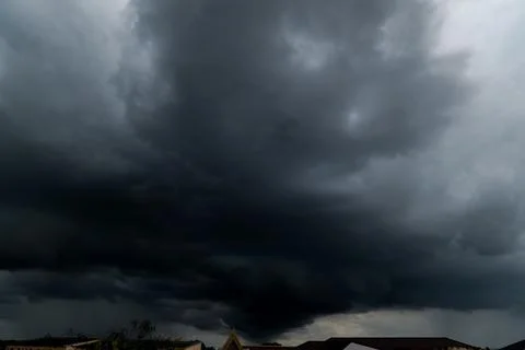 Dark storm clouds with background,Dark clouds before a thunder-storm. Stock Photos