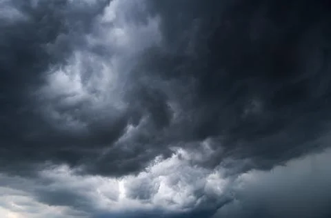 Dark storm clouds with background,Dark clouds before a thunder-storm. Stock Photos