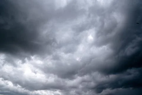 Dark storm clouds with background,Dark clouds before a thunder-storm. Фото