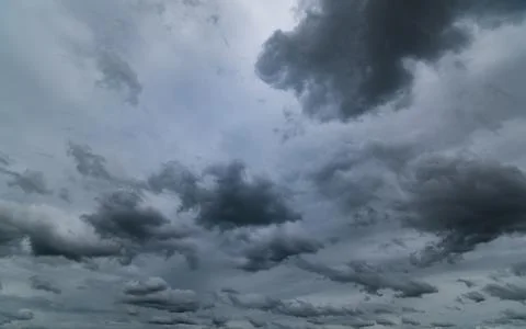Dark storm clouds with background,Dark clouds before a thunder-storm. Stock Photos