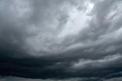 Dark storm clouds with background,Dark clouds before a thunder-storm. Фото