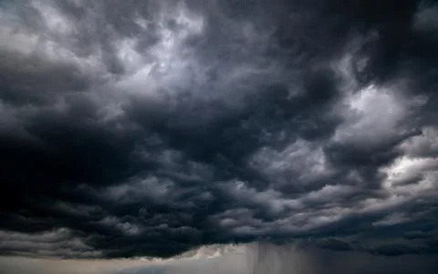 Dark storm clouds with background,Dark clouds before a thunder-storm. Фото