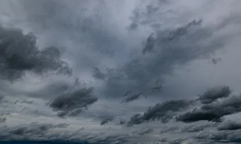 Dark storm clouds with background,Dark clouds before a thunder-storm. Stock Photos