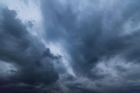 Dark storm clouds with background,Dark clouds before a thunder-storm. Фото