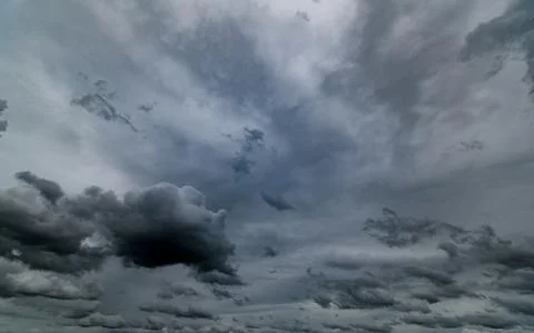 Dark storm clouds with background,Dark clouds before a thunder-storm. Stockfoto's