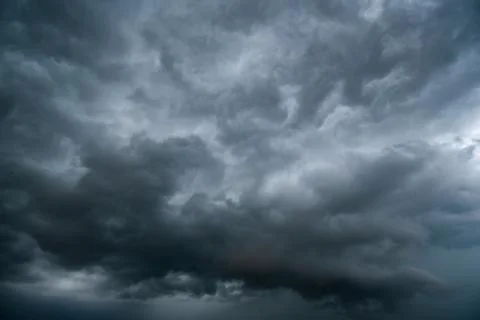 Dark storm clouds with background,Dark clouds before a thunder-storm. 库存照片