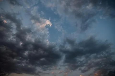 Dark storm clouds with background,Dark clouds before a thunder-storm. Stock Photos