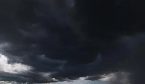Dark storm clouds with background,Dark clouds before a thunder-storm. Stock Photos