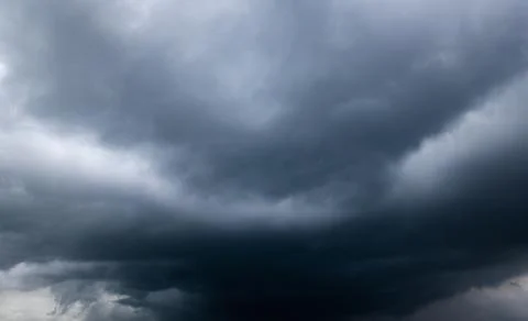 Dark storm clouds with background,Dark clouds before a thunder-storm. Stock Photos