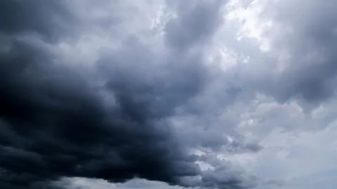 Dark storm clouds with background,Dark clouds before a thunder-storm. Stock Photos