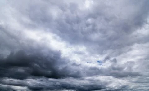 Dark storm clouds with background,Dark clouds before a thunder-storm. Stock Photos