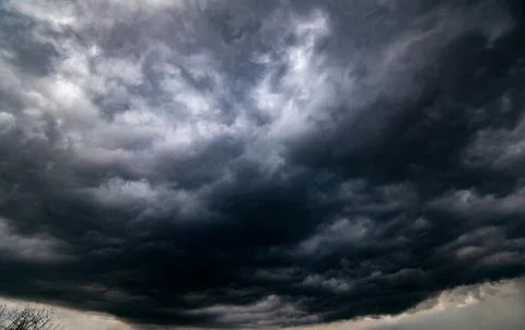 Dark storm clouds with background,Dark clouds before a thunder-storm. Stock-Fotos